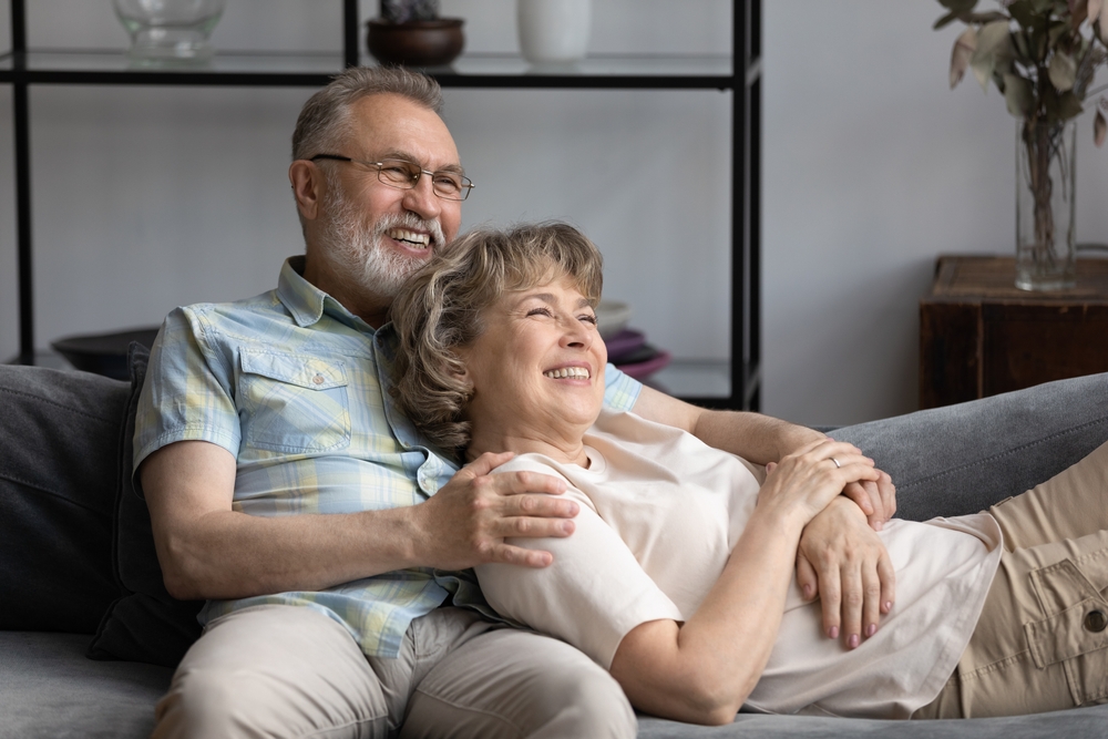Happy,Mature,Husband,Hugging,Wife,With,Love,,Care,,Support,,Tenderness, A happy couple accepting a vision plan