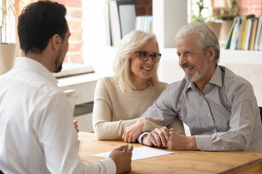 Diverse,People,Sit,At,Desk,In,Office,,Male,Realtor,Make broker offers eye care plans in OKC