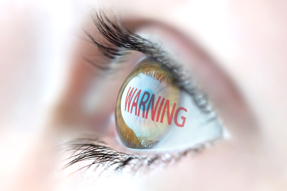 Warning,Reflection,In,Eye. July Eye Safety month