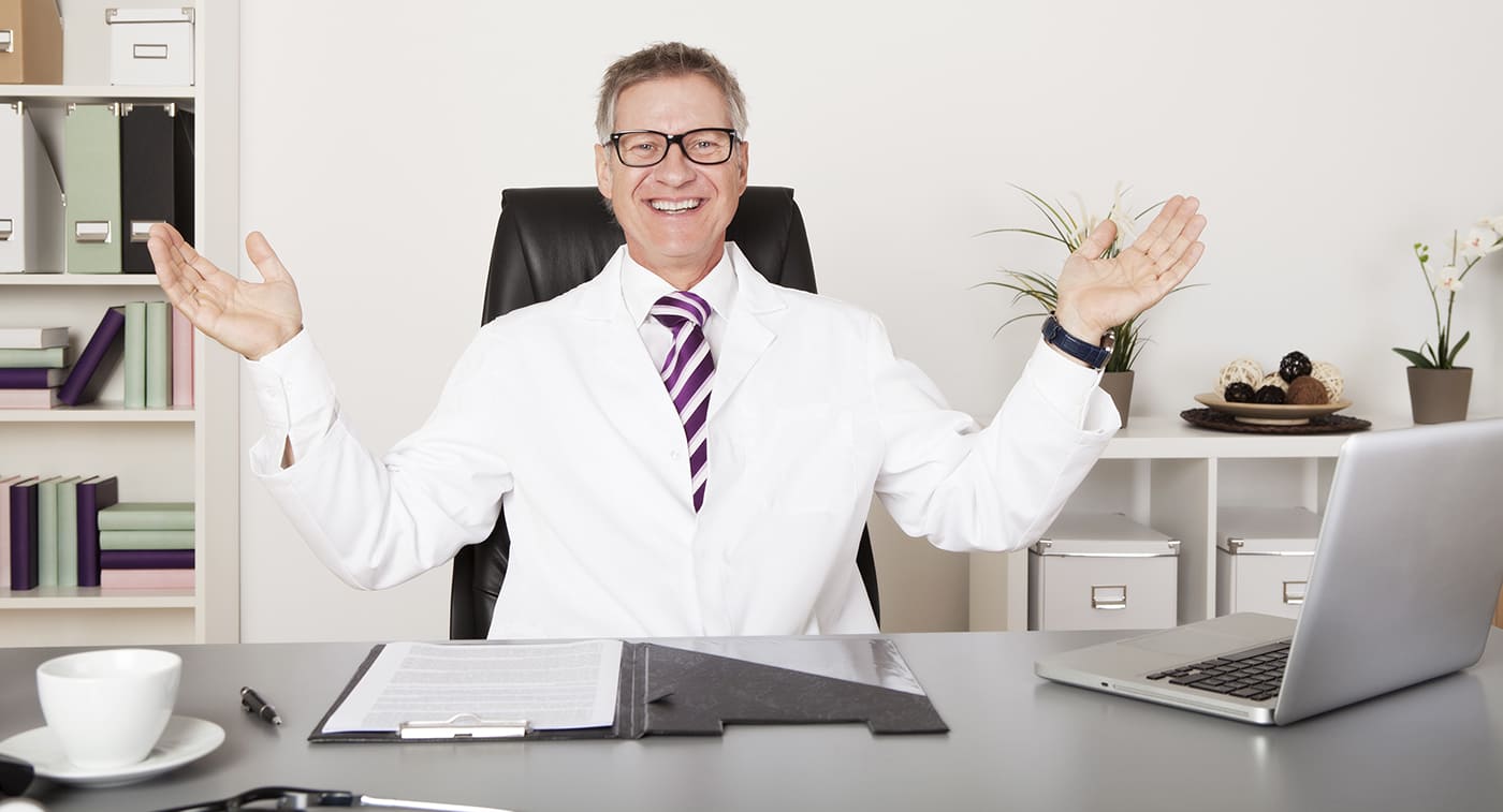 1Practice-Partner-Banner-FINAL happy doctor sitting at the table