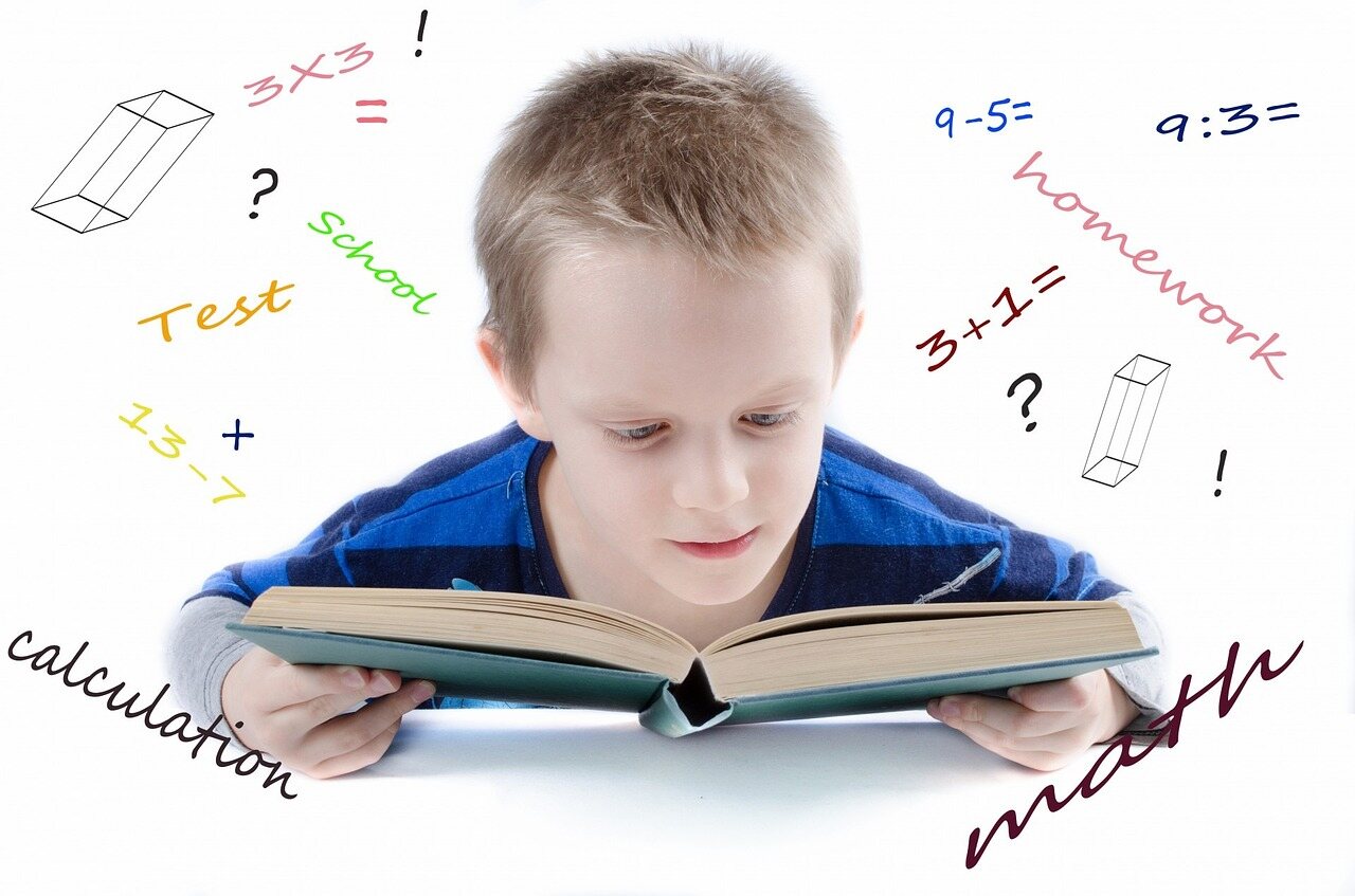 teachers are important (1) kid trying to read school book