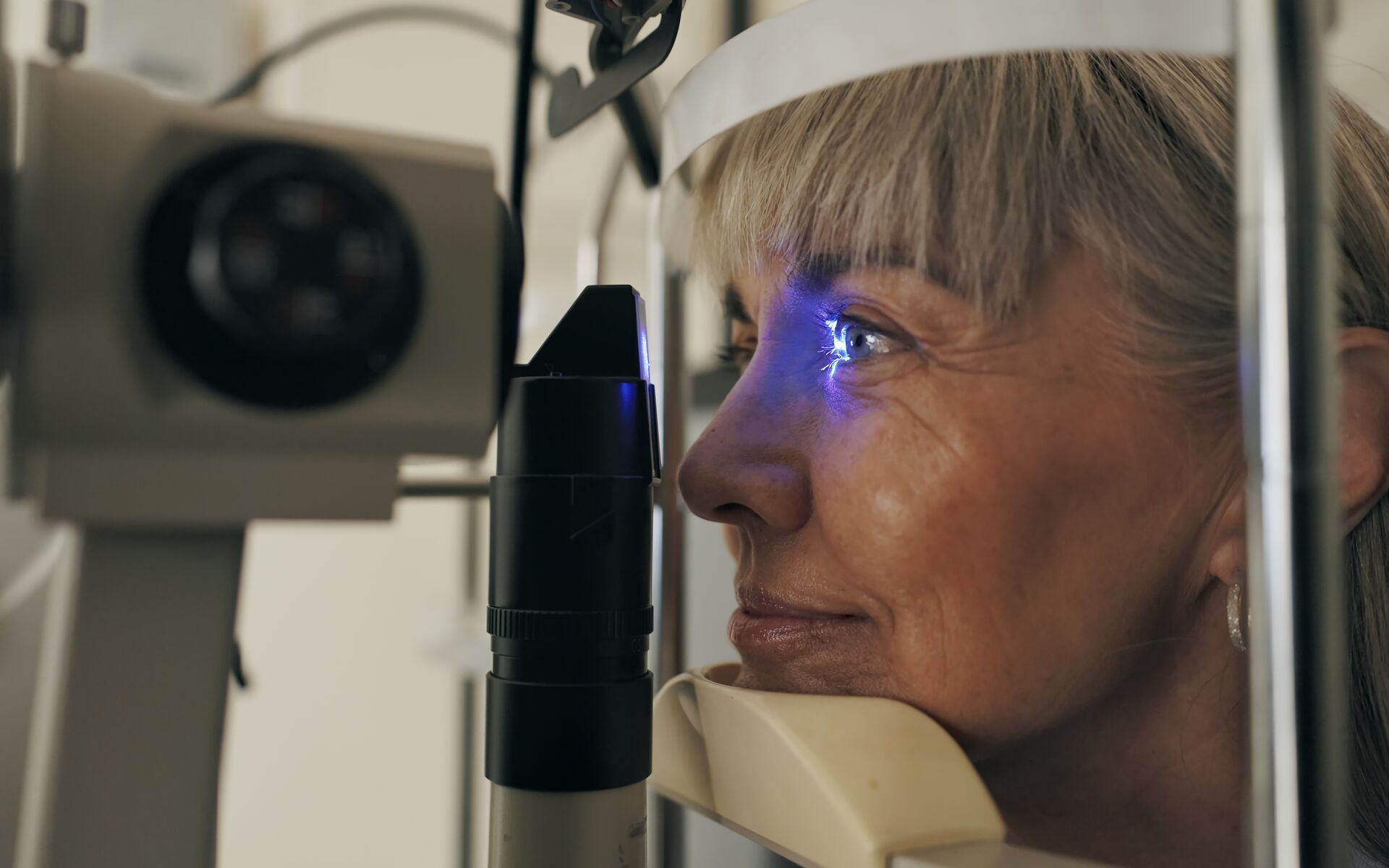 VCD pre-paid vision care plans Woman undergoing an eye exam, highlighting the importance of pre-paid vision care plans.